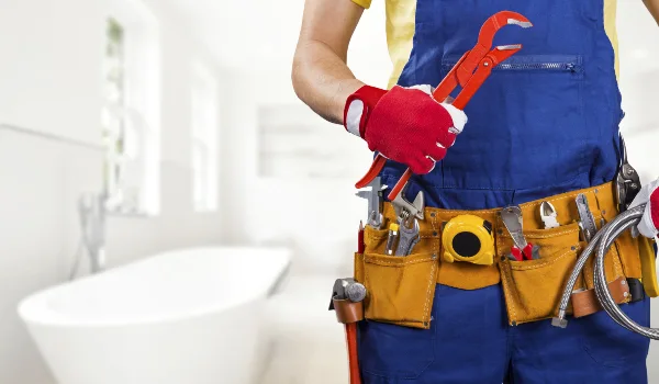 The torso of plumbing technician showing a tool belt from Quality Plumber Leander in Leander, TX - Toilet Solutions