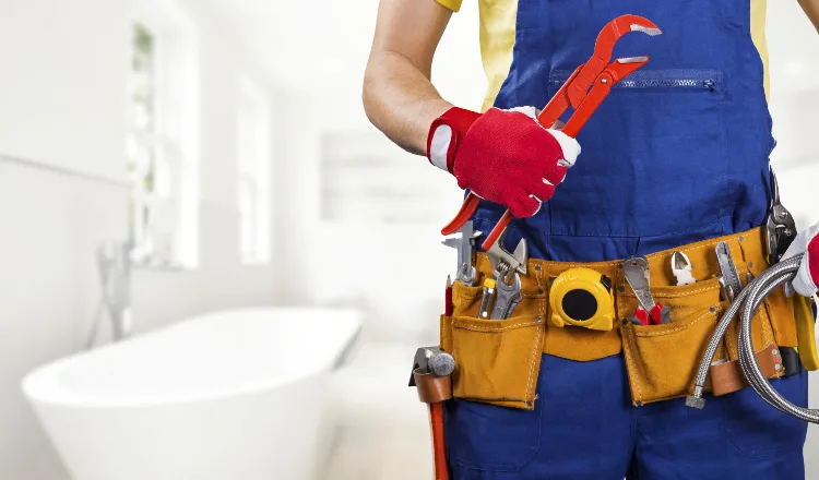 The torso of plumbing technician showing a tool belt from Quality Plumber Leander in Leander, TX - Toilet Solutions